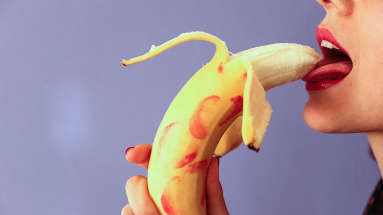 woman with banana thinking about sex