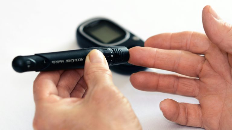 Man checking insulin level